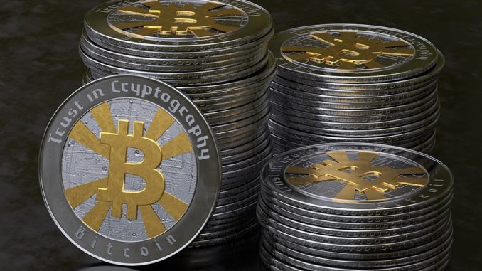 Könnten die Energiewirtschaft dezentralisieren: Bitcoins, hier in einer materialisierten und deswegen eigentlich unnötigen Variante. Foto: MasterTux / Pixabay